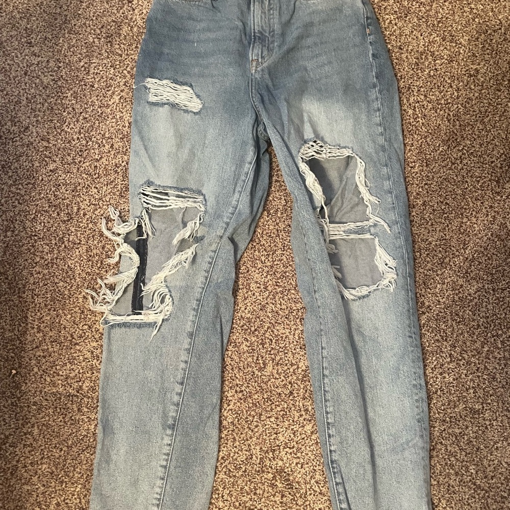 Distressed Blue Jeans
